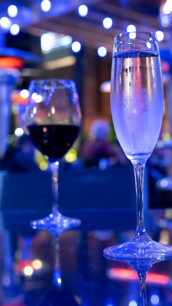 Wine and champagne glasses on a table at Blu Ristorante