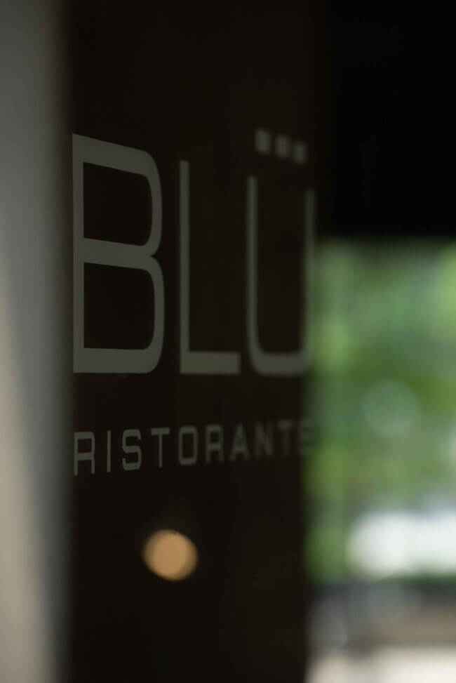 Stylish portrait of Blu Ristorante bartender preparing a crafted cocktail